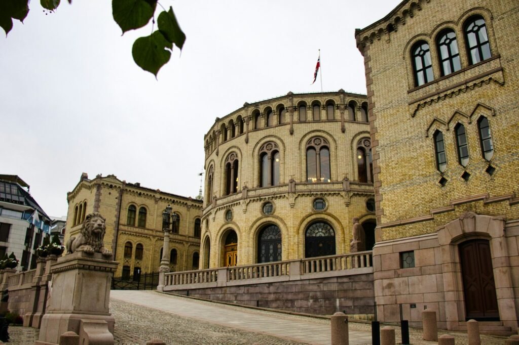 Ornate building with arched windows and yellow brick